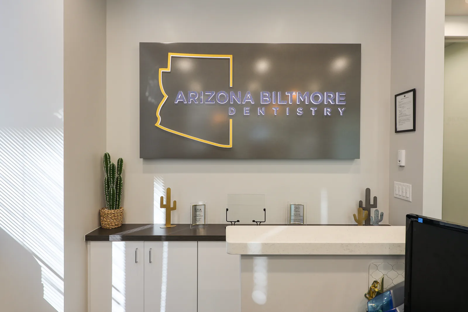 Arizona Biltmore Dentistry logo displayed in the practice reception area
